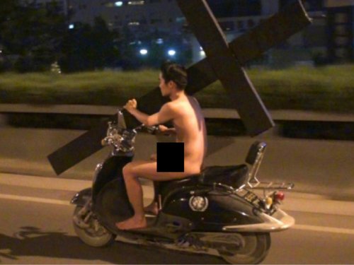 Beijing Traffic Naked Man Scooter